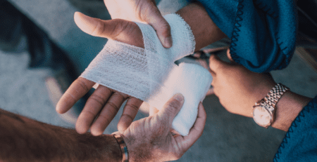 what should be in a first aid kit at work